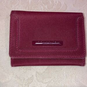 Wallet NWOT bifold with multiple sections. Reaction Kenneth Cole.